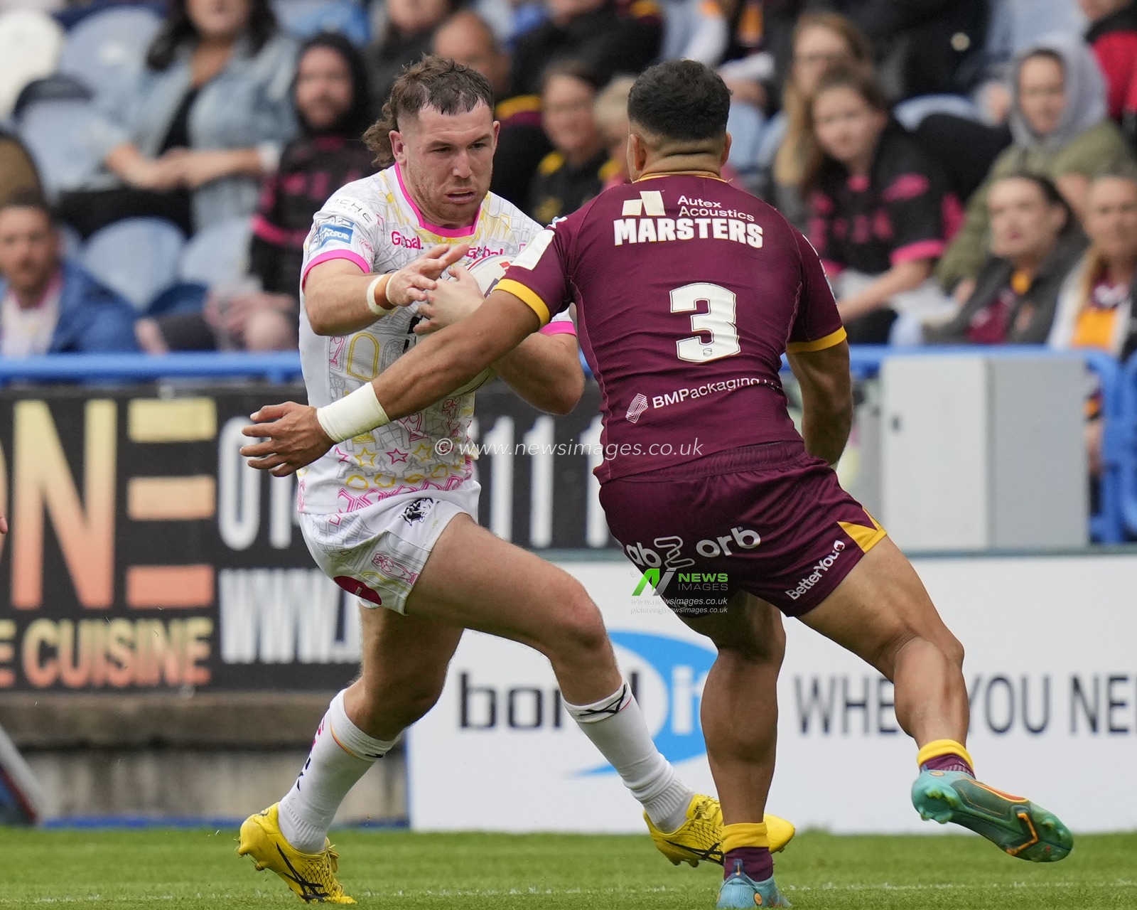 Cameron Smith #13 of Leeds Rhinos runs at Esan Marsters #3 of Huddersfield Giants during the Betfred Super League Round 23 match Huddersfield Giants vs Leeds Rhinos at John Smith's Stadium, Huddersfield, United Kingdom, 27th August 2023

(Photo by Steve Flynn/News Images)