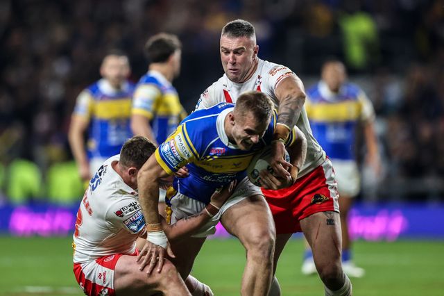 Cooper Jenkins of Leeds Rhinos is tackled by Curtis Sironen of St. Helens during the Betfred Super League play-off Eliminator 1 match Leeds Rhinos vs St Helens at Headingley Stadium, Leeds, United Kingdom, 27th September 2025

(Photo by Alfie Cosgrove/News Images)