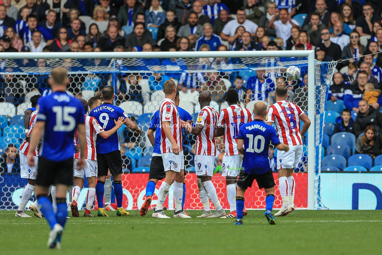15th September 2018, Hillsborough, Sheffield, England; Sky Bet EFL Championship, Sheffield Wednesday v Stoke City ;  Barry Bannan of Sheffield Wednesday scores from a free kick to make it 2-2



EDITORIAL USE ONLY No use with unauthorised audio, video, data, fixture lists, club/league logos or 'live' services. Online in-match use limited to 45 images, no video emulation. No use in betting, games or single club/league/player publications and all English Football League images are subject to DataCo Licence