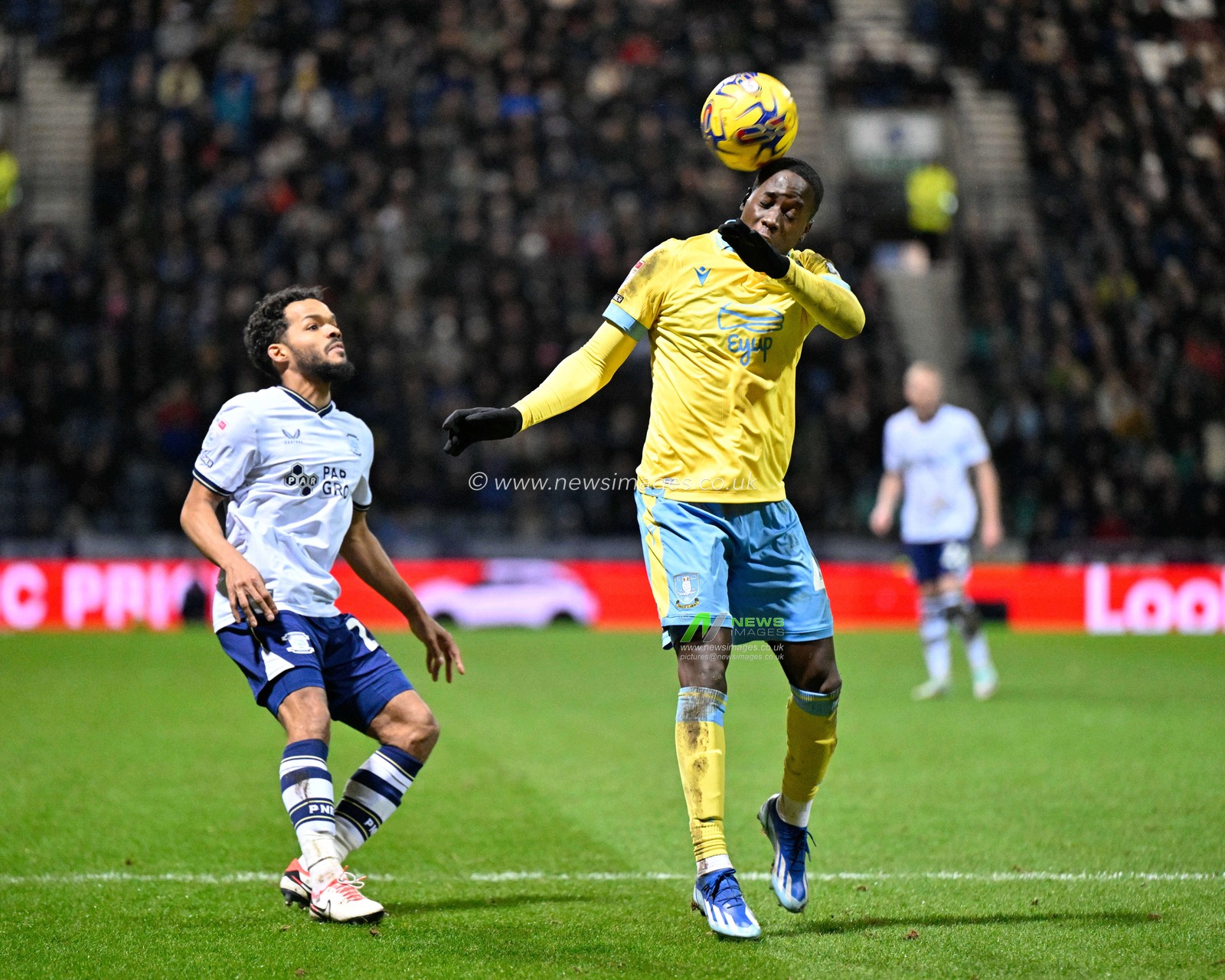 Djeidi Gassama #41 of Sheffield Wednesday heads the ball, during the Sky Bet Championship match Preston North End vs Sheffield Wednesday at Deepdale, Preston, United Kingdom, 29th December 2023

(Photo by Cody Froggatt/News Images)