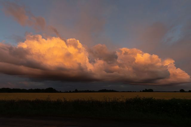 The sun sets near Luton Airport