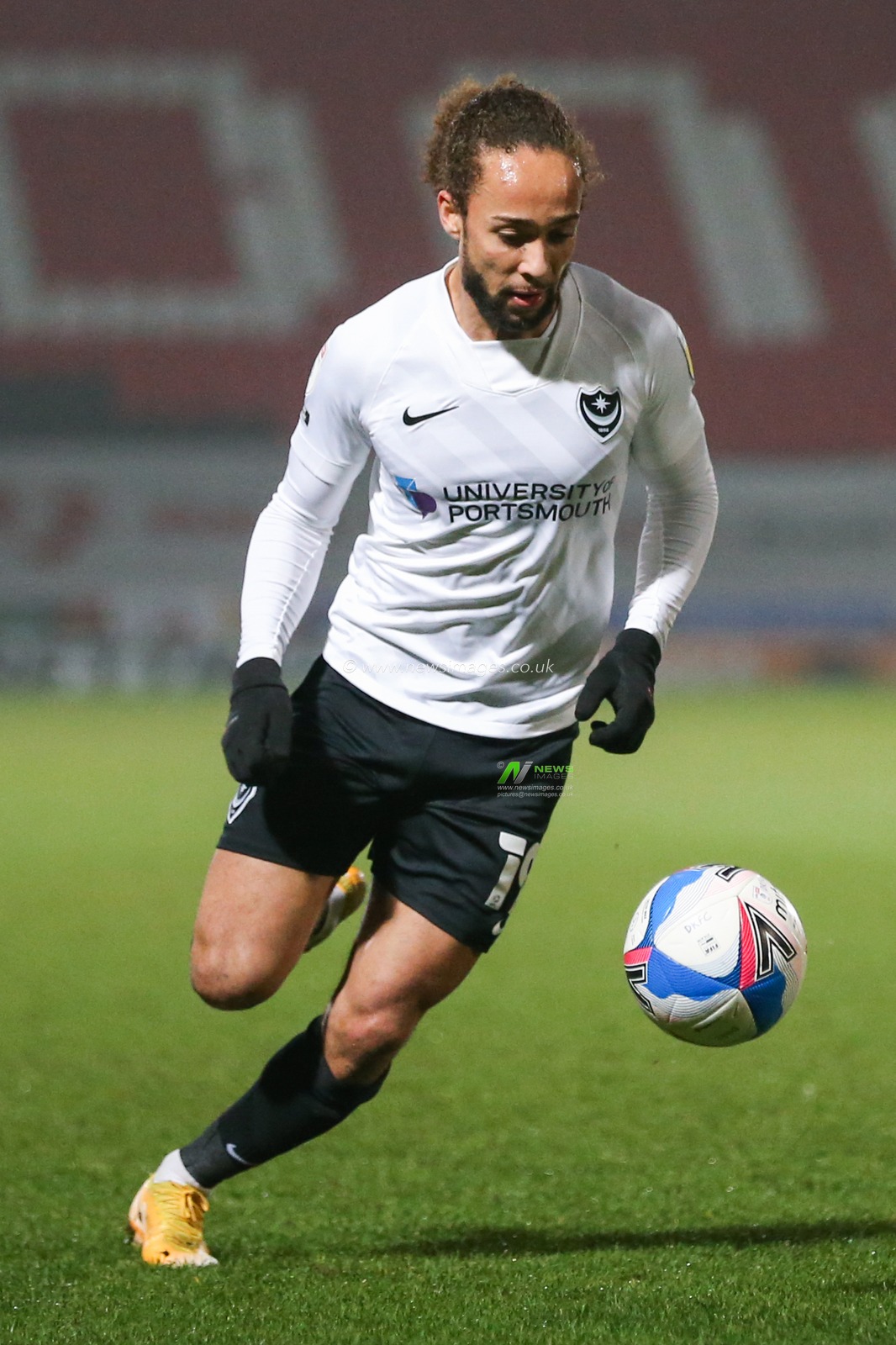 Marcus Harness #19 of Portsmouth in action during the game