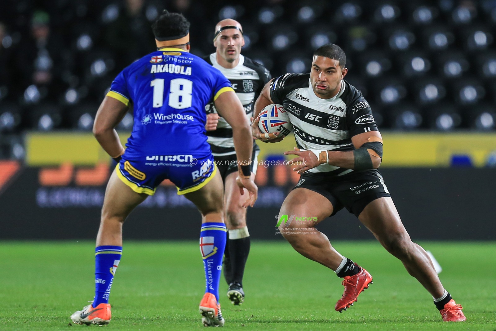 12th March 2020, KCOM Stadium, Hull, England; Betfred Super League, Hull FC v Warrington Wolves : Chris Satae (10) of Hull FC runs at Sitaleki Akauola (18) of Warrington Wolves