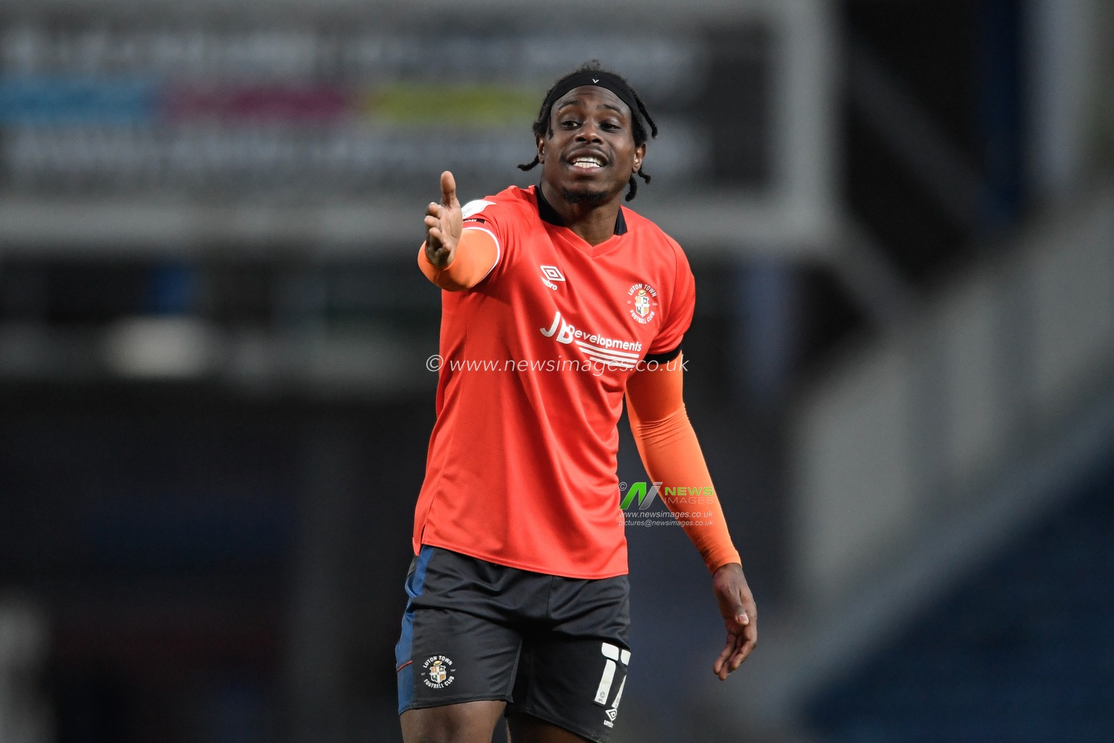Pelly-Ruddock Mpanzu #17 of Luton Town gives instructions during the game