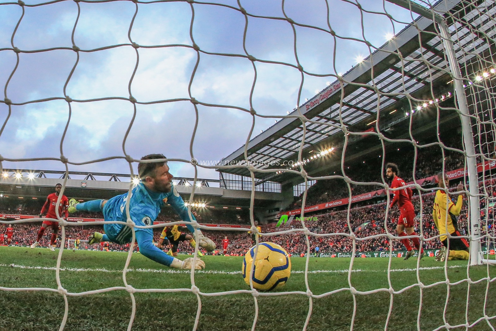 14th December 2019, Anfield, Liverpool, England; Premier League, Liverpool v Watford :  Mohamed Salah (11) of Liverpool celebrates his goal to make it 2-0

Credit: Mark Cosgrove/News Images