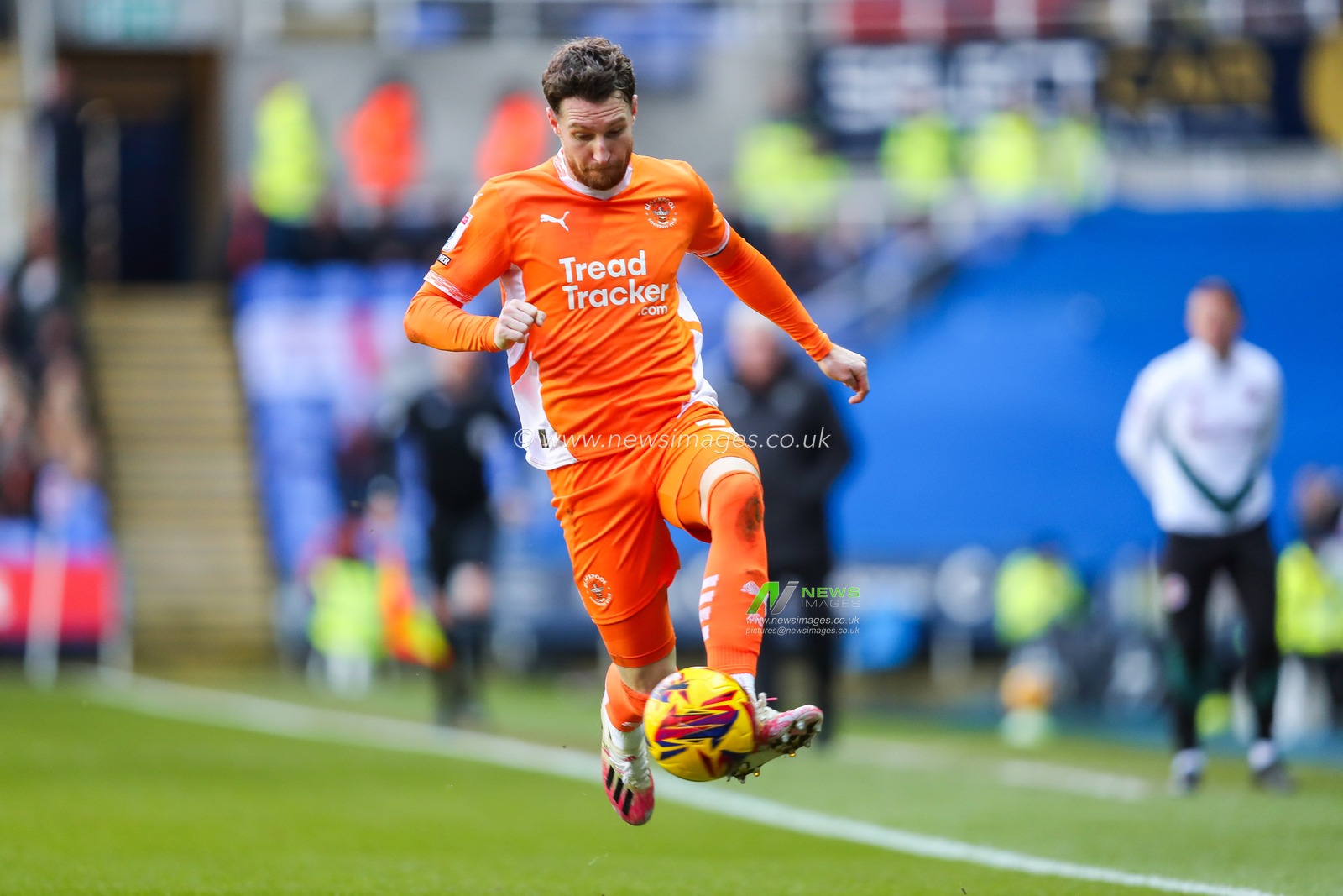 James Husband of Blackpool controls the ball during the Sky Bet League 1 match Reading vs Blackpool at Select Car Leasing Stadium, Reading, United Kingdom, 14th December 2024

(Photo by Izzy Poles/News Images)
