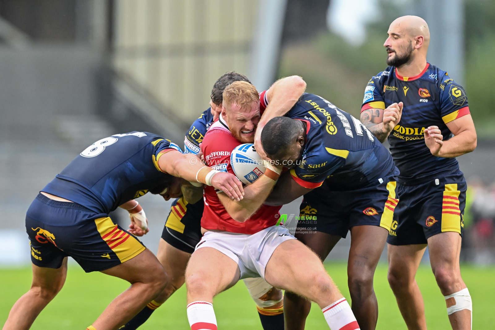 Joe Bullock of Salford Red Devils gets tackled during the Betfred Super League Round 25 match Salford Red Devils vs Catalans Dragons at Salford Community Stadium, Eccles, United Kingdom, 7th September 2024

(Photo by Cody Froggatt/News Images)