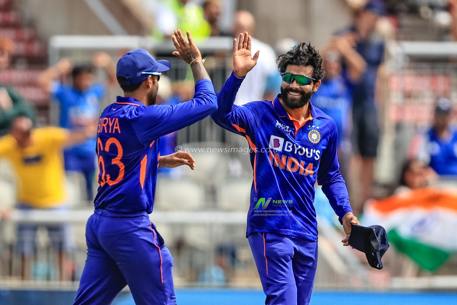 Ravindra Jadeja of India celebrates catching Liam Livingstone of England with Suryakumar Yadav of India