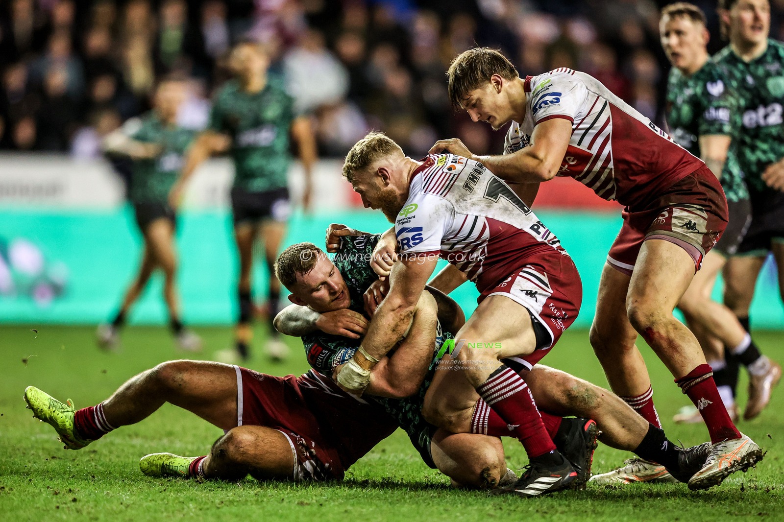 Jack Hughes of Leigh Leopards is tackled by Luke Thompson of Wigan Warriors during the Betfred Super League match Wigan Warriors vs Leigh Leopards at The Brick Community Stadium, Wigan, United Kingdom on 26 February 2026

(Photo by Alfie Cosgrove/News Images)
