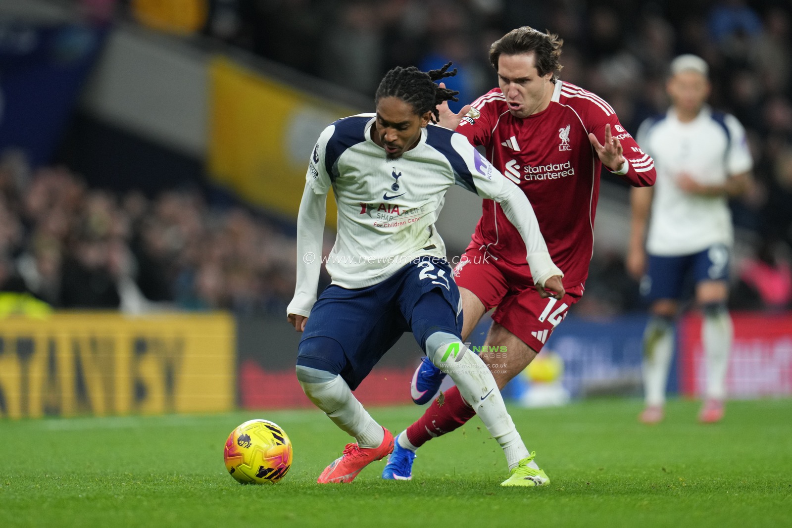 Djed Spence of Tottenham Hotspur and Federico Chiesa of Liverpool battle during the Premier League match Tottenham Hotspur vs Liverpool at Tottenham Hotspur Stadium, London, United Kingdom, 20th December 2025

(Photo by Harvey Murphy/News Images)

*** GER AUT SUI OUT ***