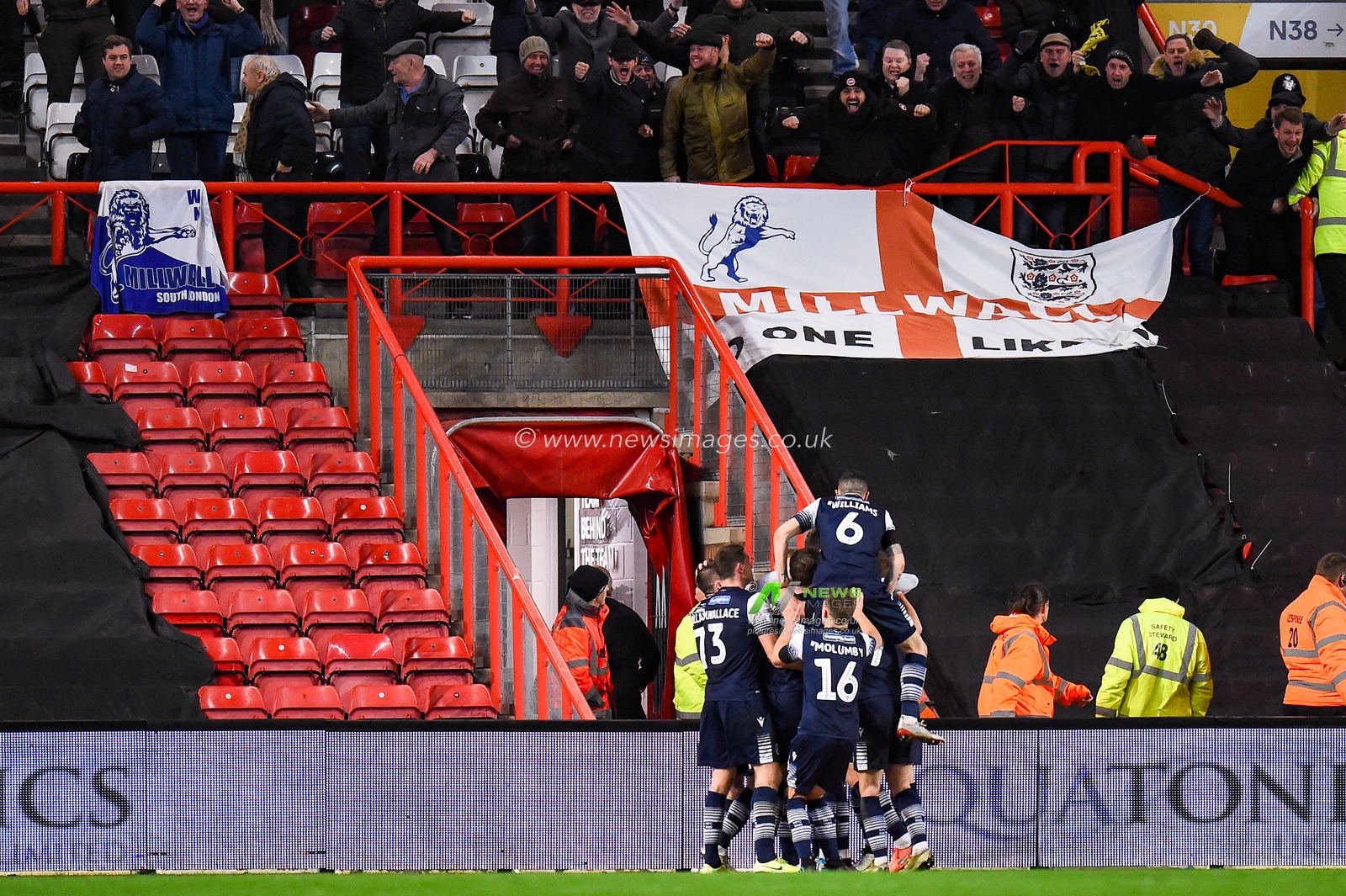 10th December 2019, Ashton Gate, Bristol, England; Sky Bet Championship, Bristol City v Millwall : Millwall celebrate their 2nd goal with their supporters

Credit: Gareth Dalley/News Images