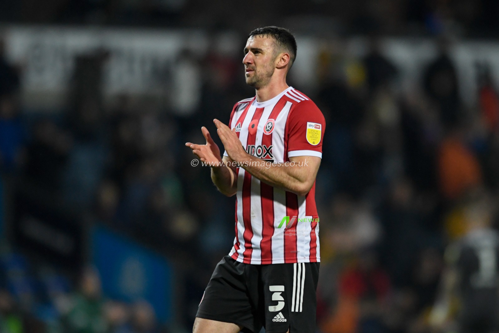 Enda Stevens #3 of Sheffield United applauds the travelling supporters at the end of the game after his side lost to Blackburn Rovers 3-1