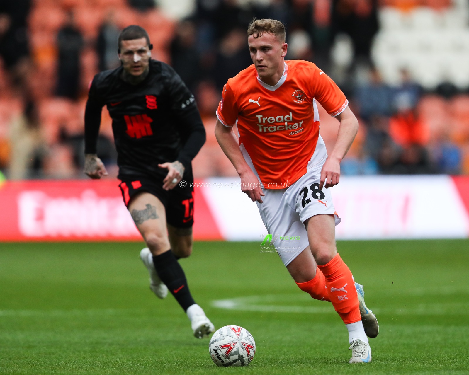 Ryan Finnigan of Blackpool goes forward with the ball during the Emirates FA Cup 2nd Round match Blackpool vs Birmingham City at Bloomfield Road, Blackpool, United Kingdom, 1st December 2024

(Photo by Gareth Evans/News Images)