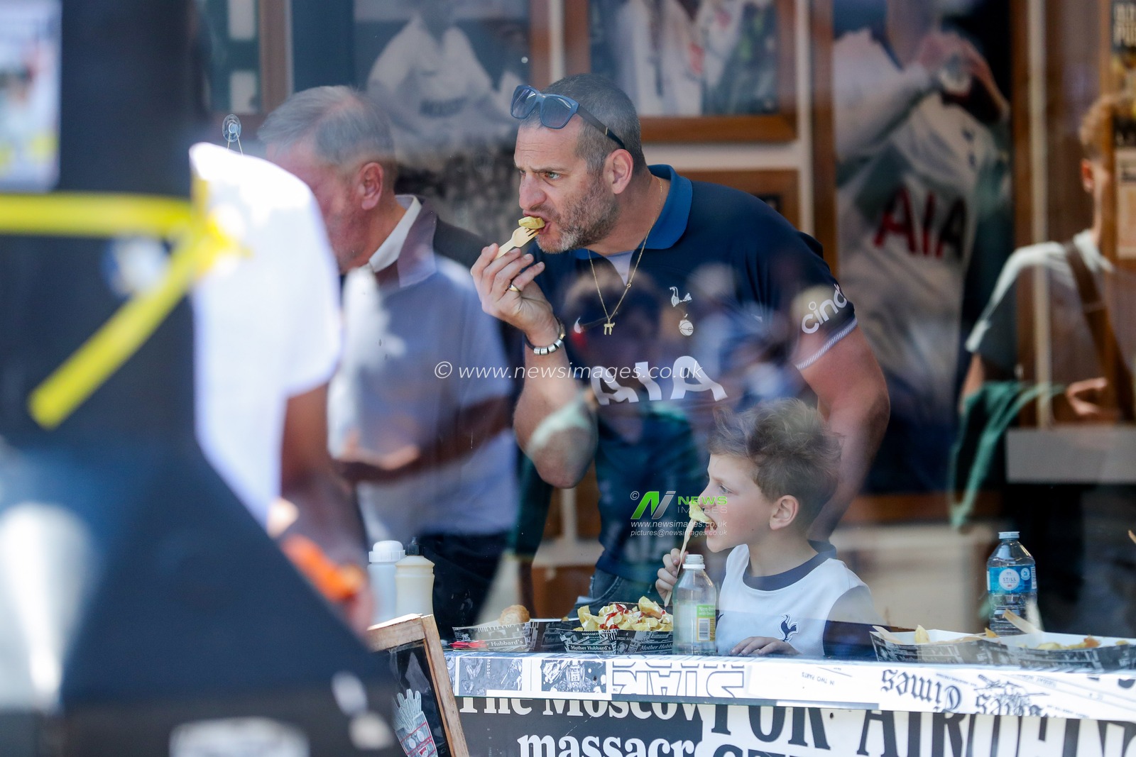 Fans eat at Mother Hubbards outside of Tottenham Hotspur Stadium prior to the Premier League match Tottenham Hotspur vs Crystal Palace at Tottenham Hotspur Stadium, London, United Kingdom, 11th May 2025

(Photo by Izzy Poles/News Images)
