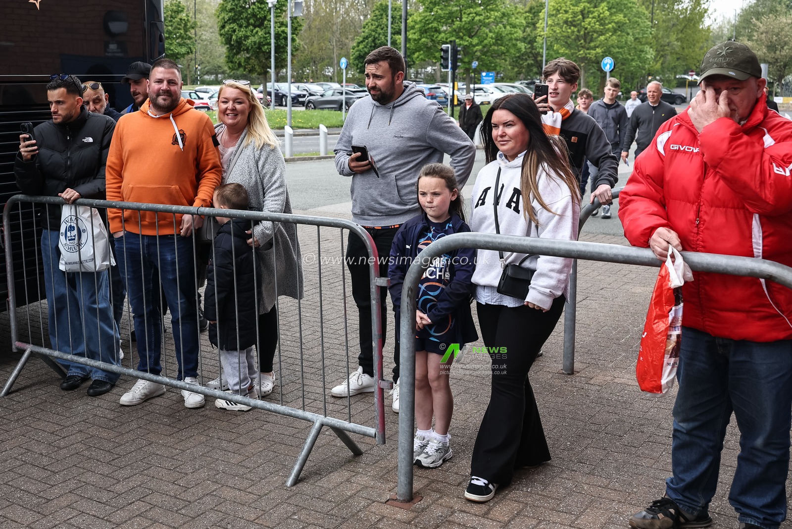 Blackpool fans wait for the team coach during the Sky Bet League 1 match Wigan Athletic vs Blackpool at The Brick Community Stadium, Wigan, United Kingdom, 26th April 2025

(Photo by Mark Cosgrove/News Images)