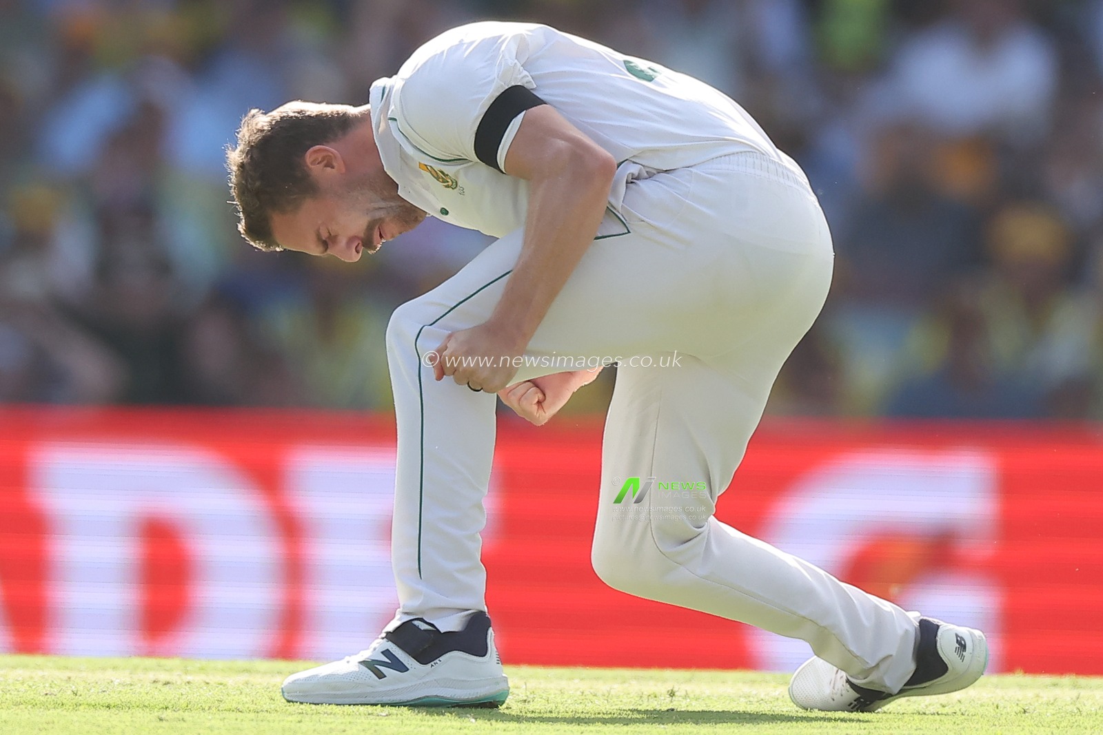 Anrich Nortje of South Africa celebrates the dismissal of  Usman Khawaja of Australia during the NRMA Insurance test Series match Australia vs South Africa at The Gabba, Brisbane Cricket Ground, Brisbane, Australia, 17th December 2022

(Photo by Patrick Hoelscher/News Images)
