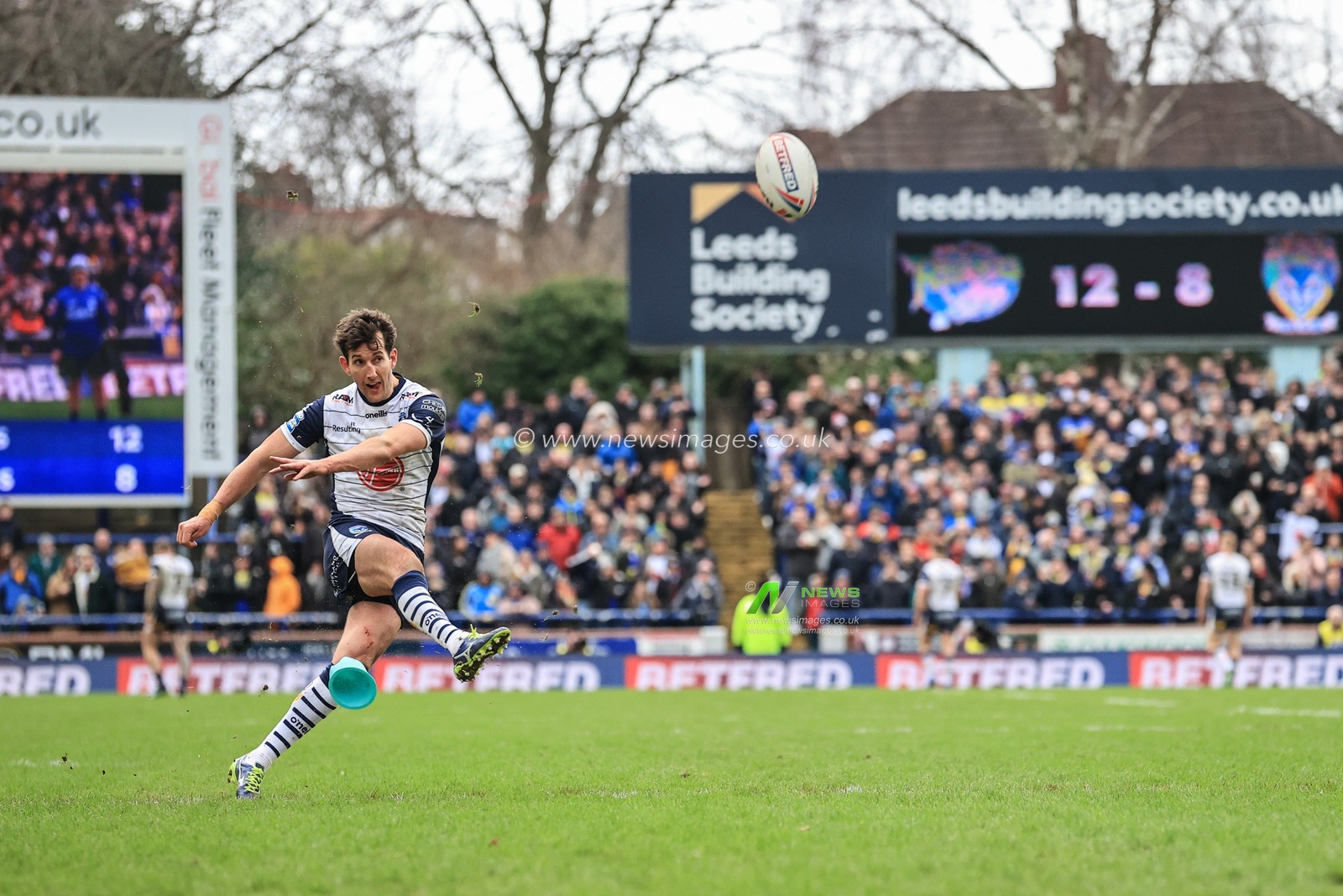 Stefan Ratchford #1 of Warrington Wolves converts for a goal