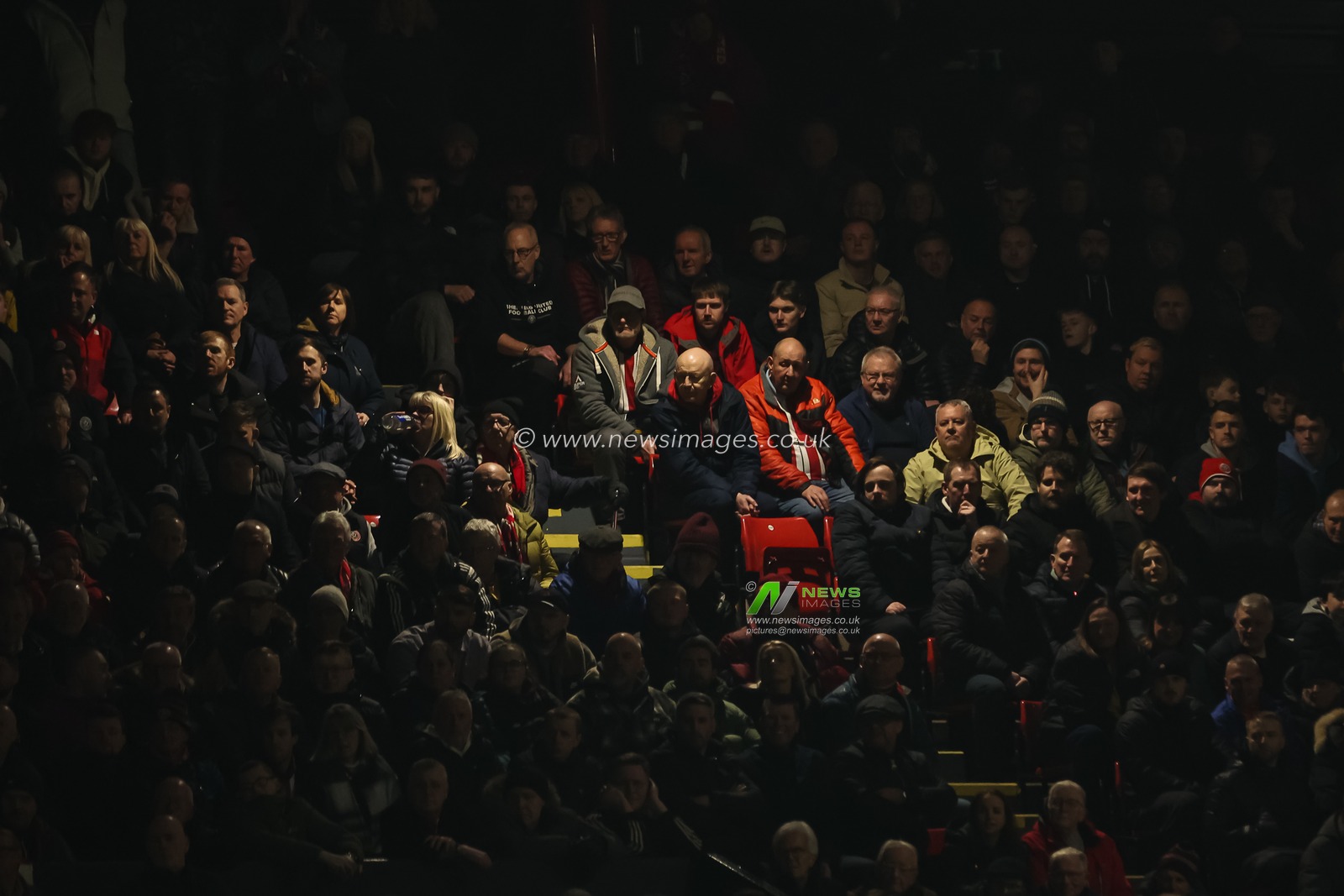 Fans in the stand in a small patch of light during the Sky Bet Championship match Sheffield United vs Leeds United at Bramall Lane, Sheffield, United Kingdom, 24th February 2025

(Photo by Mark Cosgrove/News Images)