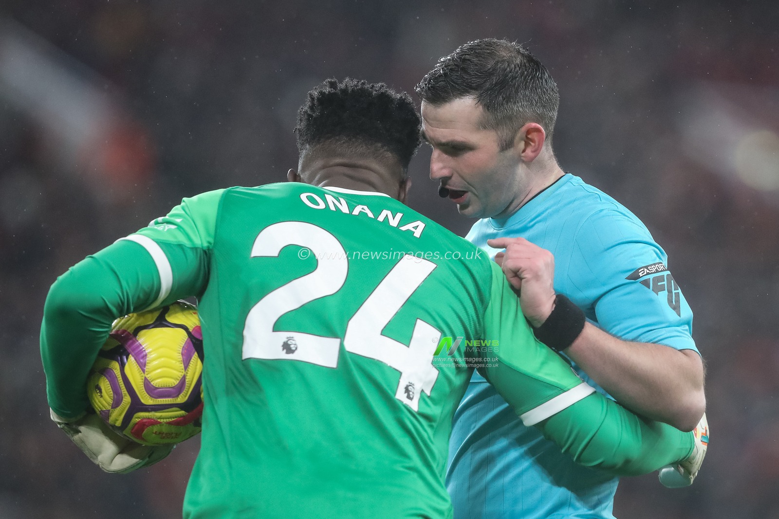 Referee Michael Oliver speaks to AndrÃ© Onana of Manchester United during the Premier League match Liverpool vs Manchester United at Anfield, Liverpool, United Kingdom, 5th January 2025

(Photo by Gareth Evans/News Images)