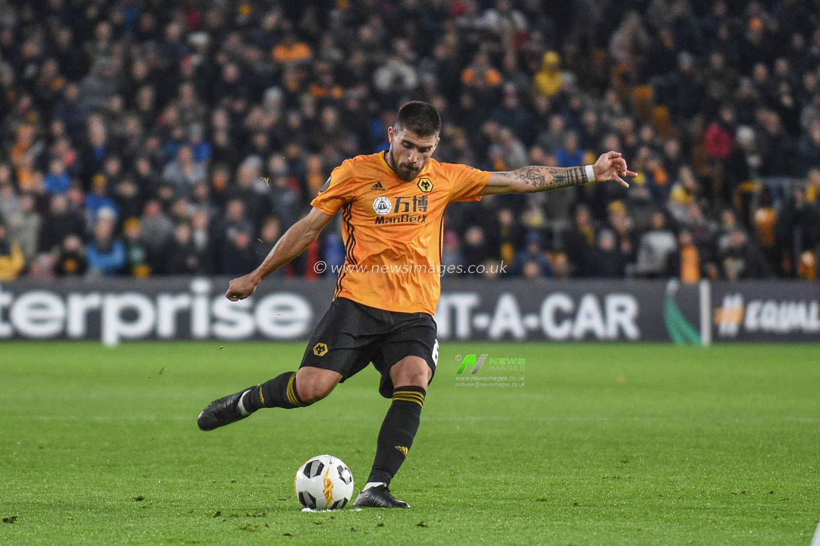 12th December 2019, Molineux, Wolverhampton, England; UEFA Europa League, Wolverhampton Wanderers v Besiktas : Ruben Neves (8) of Wolverhampton Wanderers shoots on goal 

Credit: Richard Long/News Images