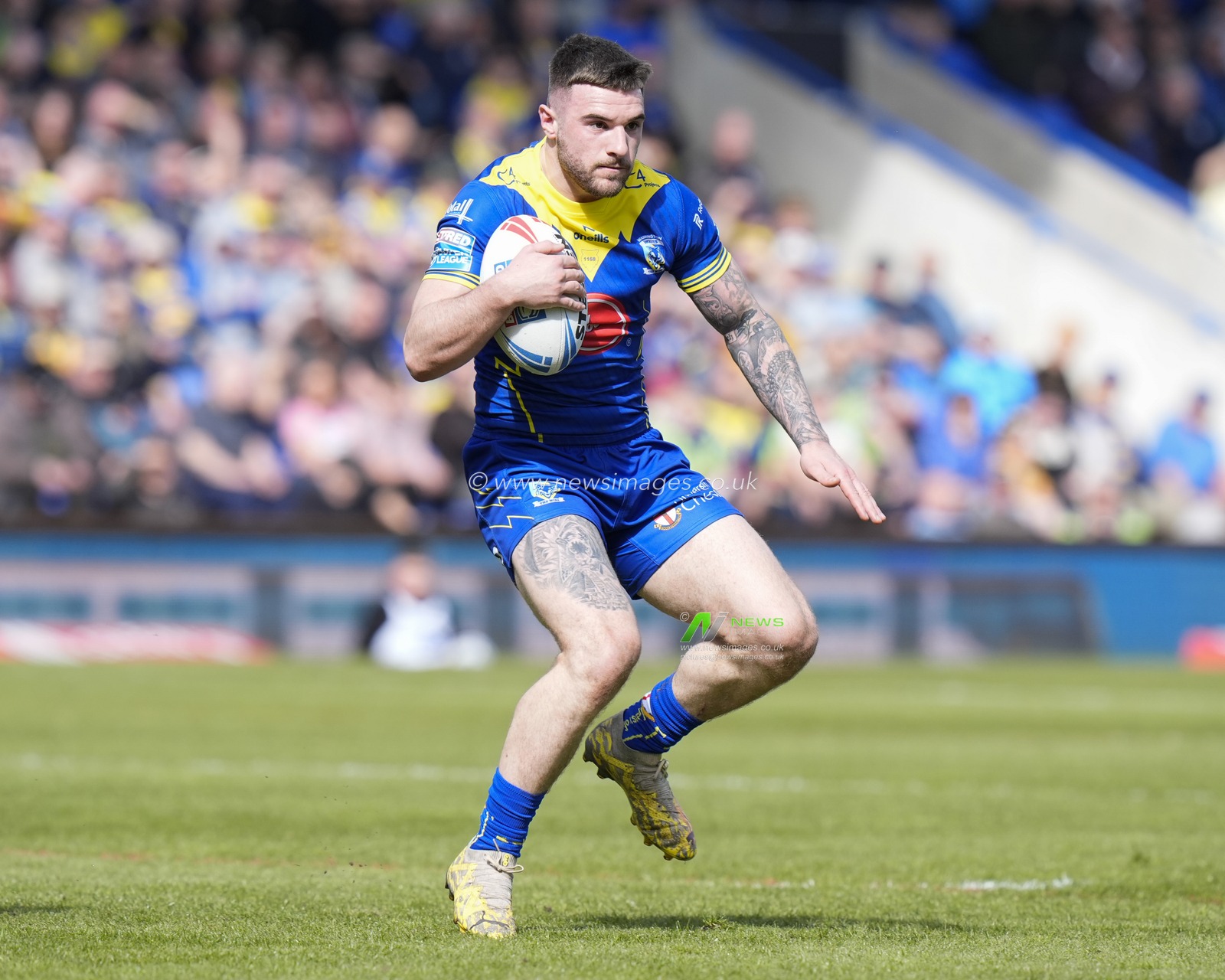 Connor Wrench of Warrington Wolves runs with the ball during the Betfred Super League Round 8 match Warrington Wolves vs Leigh Leopards at Halliwell Jones Stadium, Warrington, United Kingdom, 20th April 2024

(Photo by Steve Flynn/News Images)