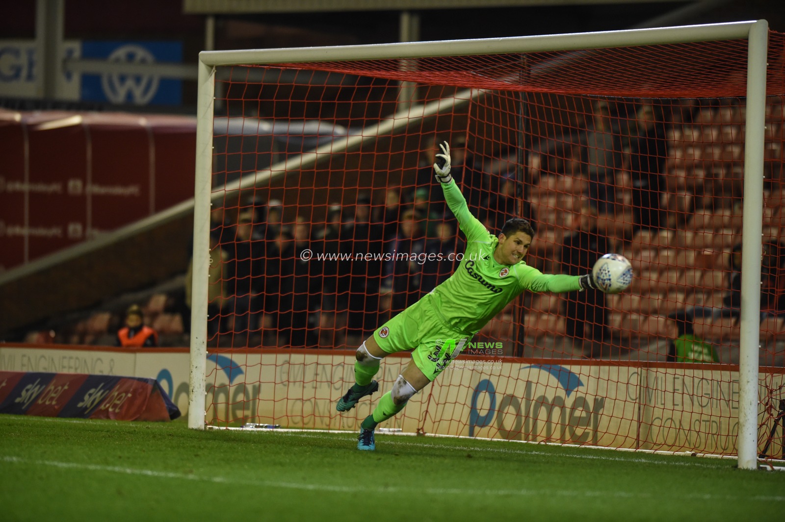 11th December 2019, Oakwell, Barnsley, England; Sky Bet Championship, Barnsley v Reading : Rafael Carbral Barbosa (33) of Reading FC makes a first half save to keep the half time score 0-0

Credit: Dean Williams/News Images