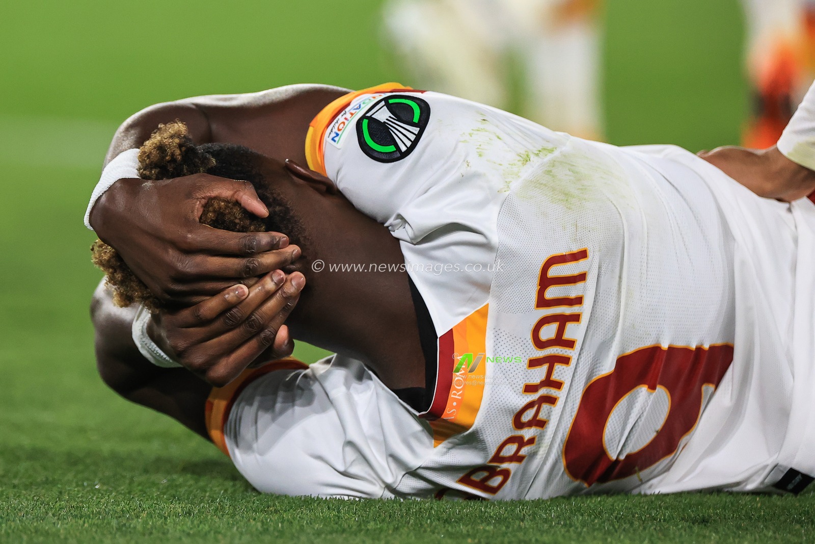 Tammy Abraham #9 of Roma holds his head after take a knock during the game