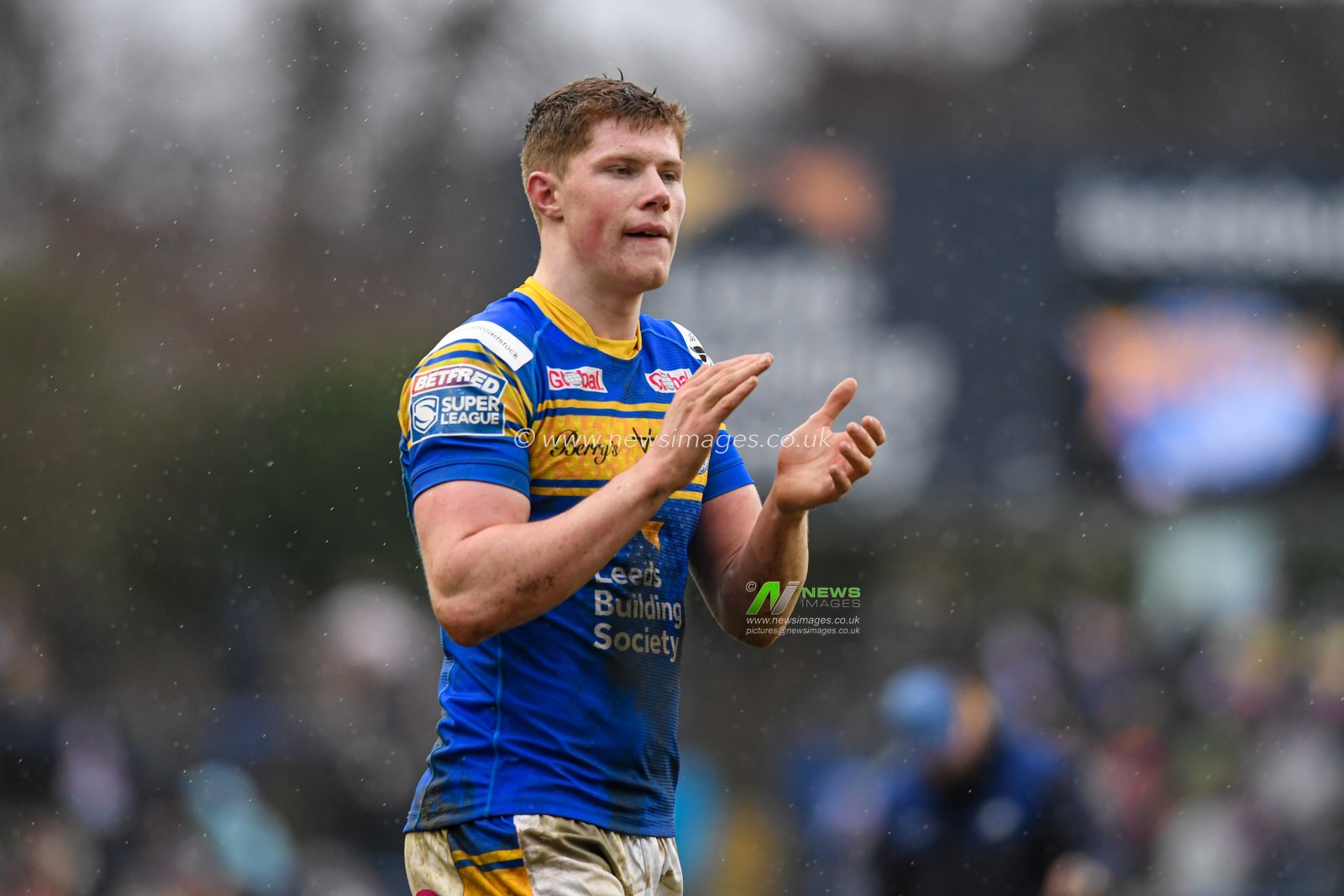 Morgan Gannon #21 of Leeds Rhinos applauds the home supporters after his side lost the game against Warrington Wolves 20-22