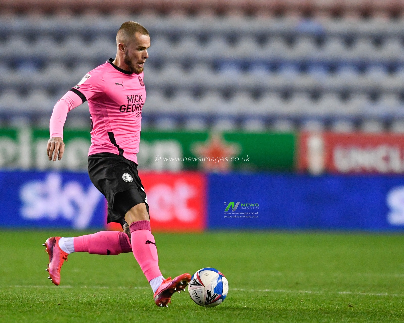 Joe Ward (23) of Peterborough United runs forward with the ball