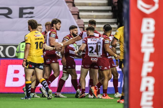 Abbas Miski of Wigan Warriors celebrates his try during the Betfred Super League Round 26 match Wigan Warriors vs Castleford Tigers at The Brick Community Stadium, Wigan, United Kingdom, 12th September 2025

(Photo by Alfie Cosgrove/News Images)
