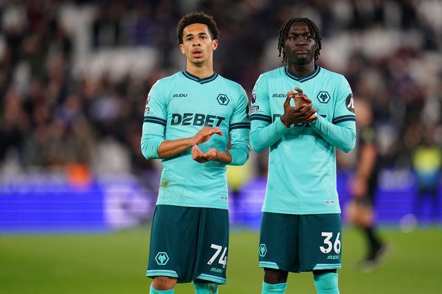 Tom Edozie of Wolverhampton Wanderers and Mateus Mane of Wolverhampton Wanderers at full time during the Premier League match West Ham United vs Wolverhampton Wanderers at London Stadium, London, United Kingdom on 10 April 2026

(Photo by Harvey Murphy/News Images)