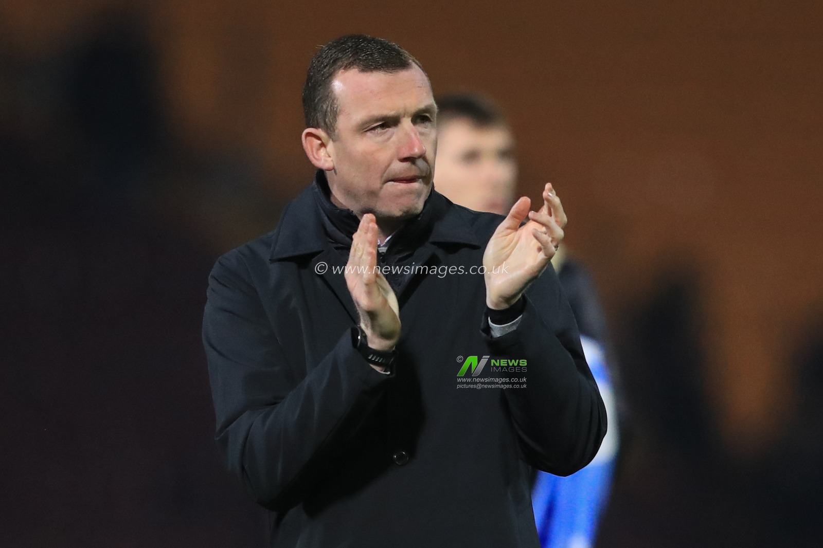 Neill Collins Head coach of Barnsley applauds the travelling fans during the Bristol Street Motors Trophy match Bradford City vs Barnsley at University of Bradford Stadium, Bradford, United Kingdom, 21st November 2023

(Photo by Alfie Cosgrove/News Images)