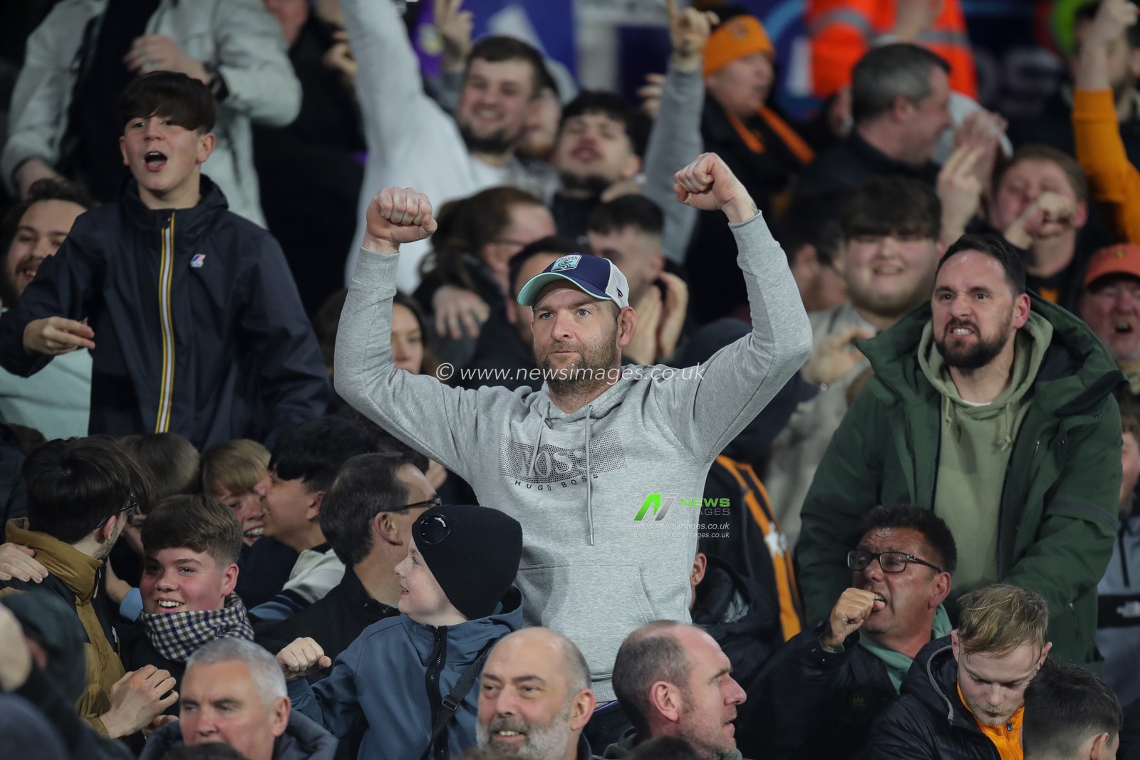 Hull City supporters celebrate the equalising goal in the first half of the Sky Bet Championship match Leeds United vs Hull City at Elland Road, Leeds, United Kingdom, 1st April 2024

(Photo by James Heaton/News Images)
