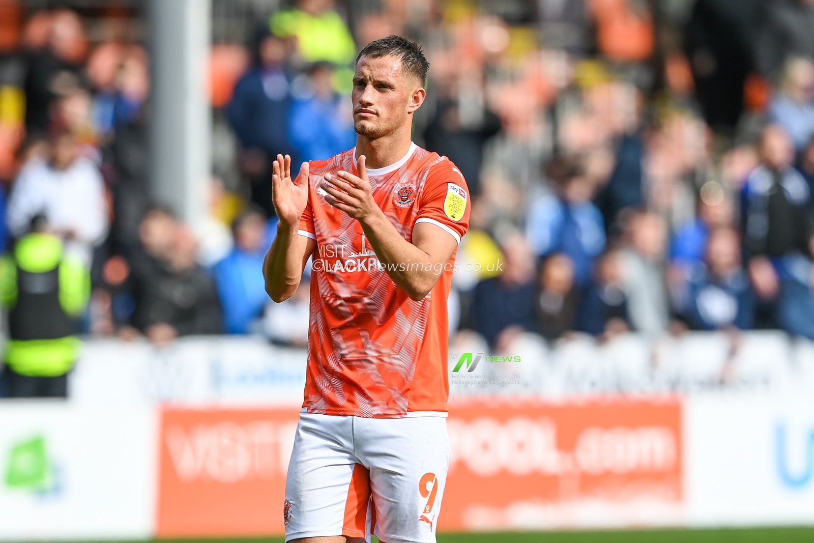 Jerry Yates #9 of Blackpool applauds the fans at the end of the game