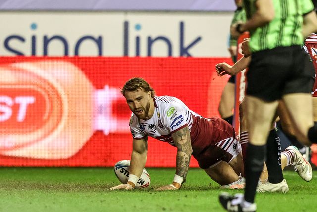 Adam Keighran of Wigan Warriors goes over for a try during the Betfred Super League match Wigan Warriors vs Leigh Leopards at The Brick Community Stadium, Wigan, United Kingdom on 26 February 2026

(Photo by Alfie Cosgrove/News Images)