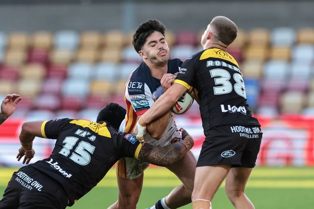 Guillermo Aispuro-Bichet of Catalans Dragons is tackled by Xavier Va'a and Will Roberts of York Knights during the Betfred Super League round 12 match York Knights vs Catalans Dragons at LNER Community Stadium, York, United Kingdom on 23 May 2026

(Photo by Mark Cosgrove/News Images)