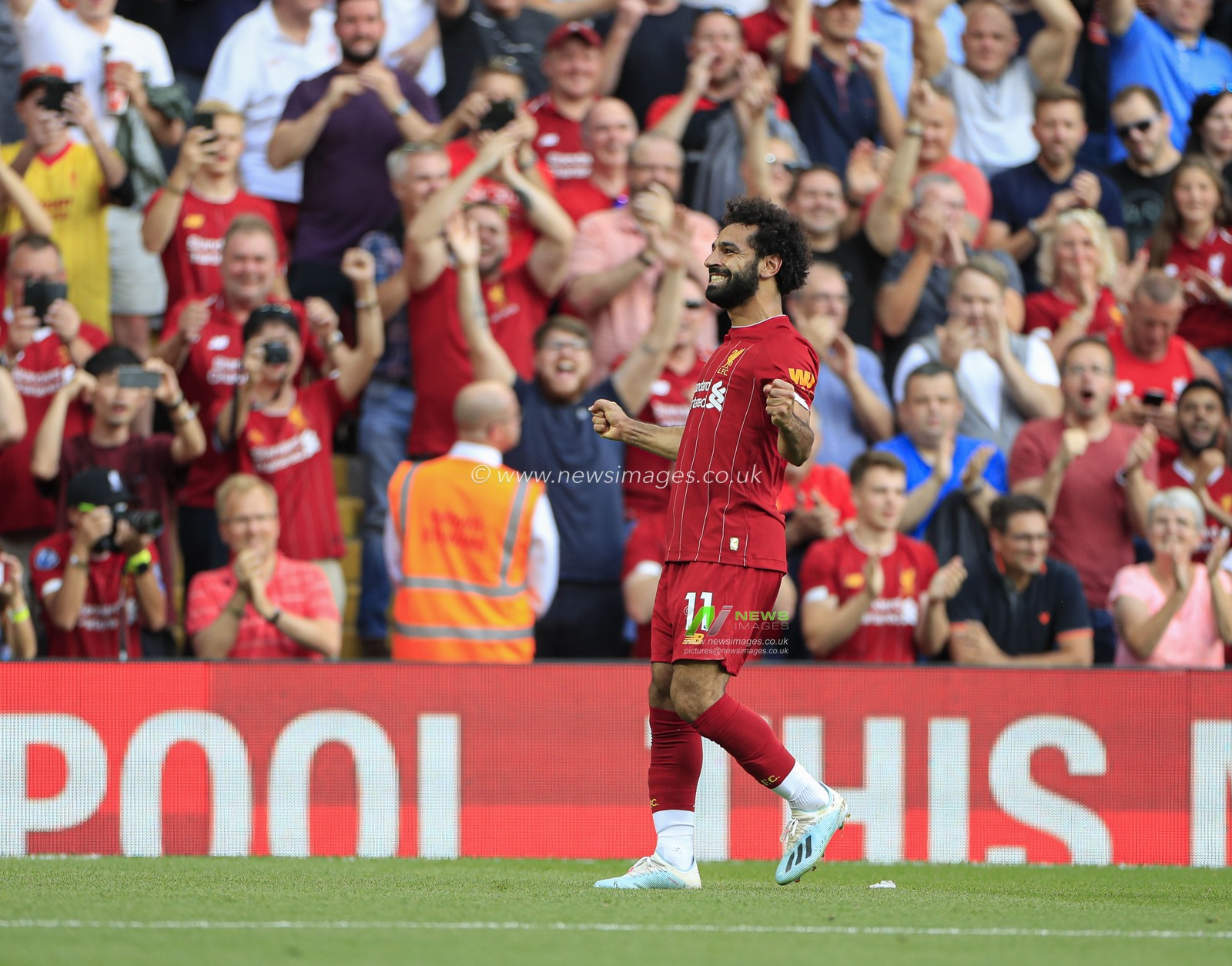 23rd August 2019 , Anfield, Liverpool, England; Premier League Football, Liverpool vs Arsenal ;   Mohamed Salah (11) of Liverpool celebrates scoring the third goal in thew 57th minute, 3-0 to Liverpool

Credit: Conor Molloy/News Images 


Premier League/EFL Football images are subject to DataCo Licence