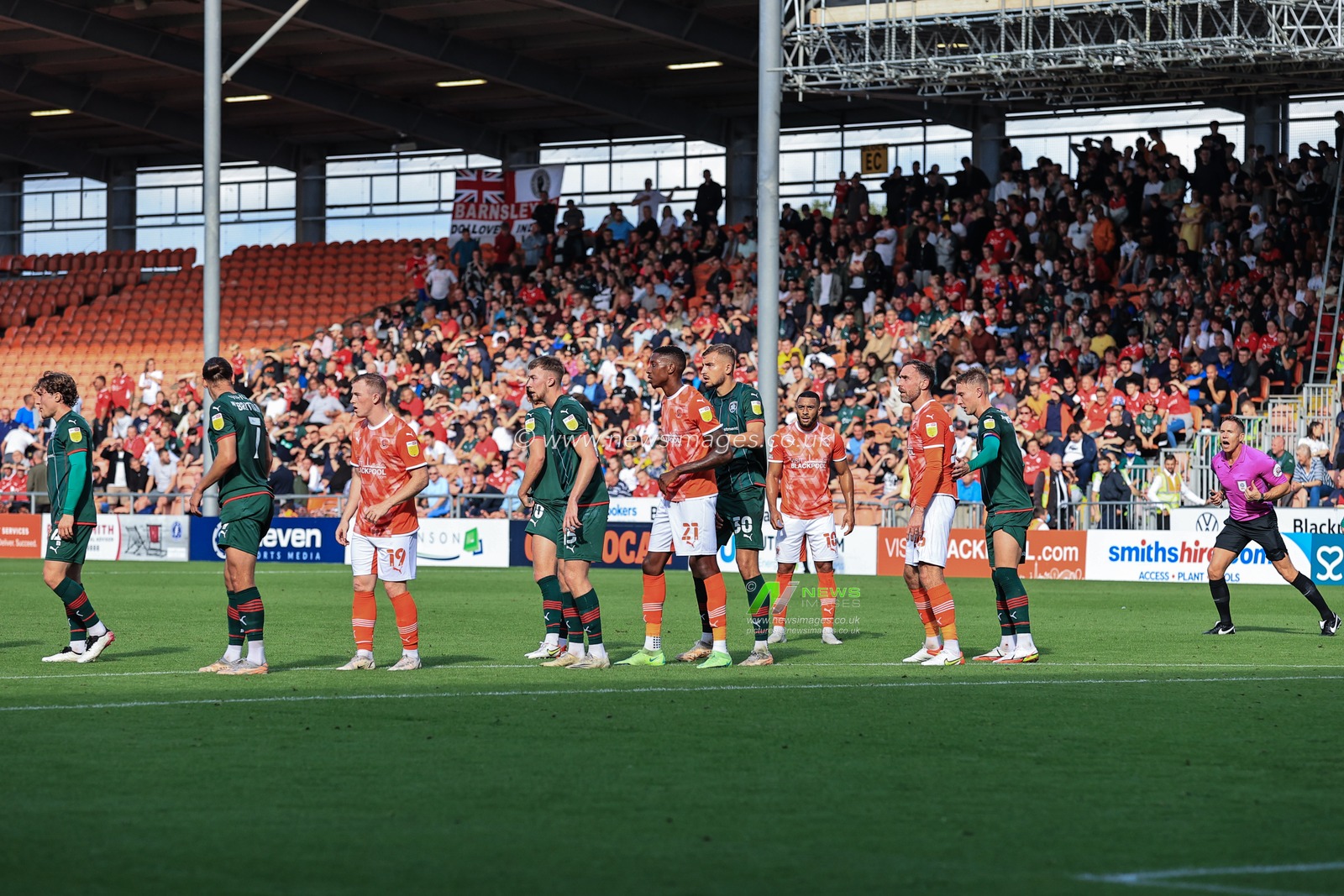 Blackpool players line up for a free-kick