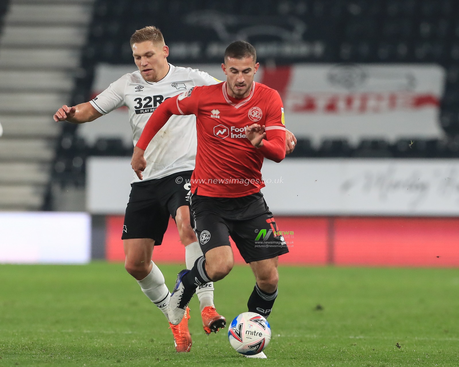 Dominic Ball (12) of Queens Park Rangers breaks free from  Martyn Waghorn (9) of Derby County