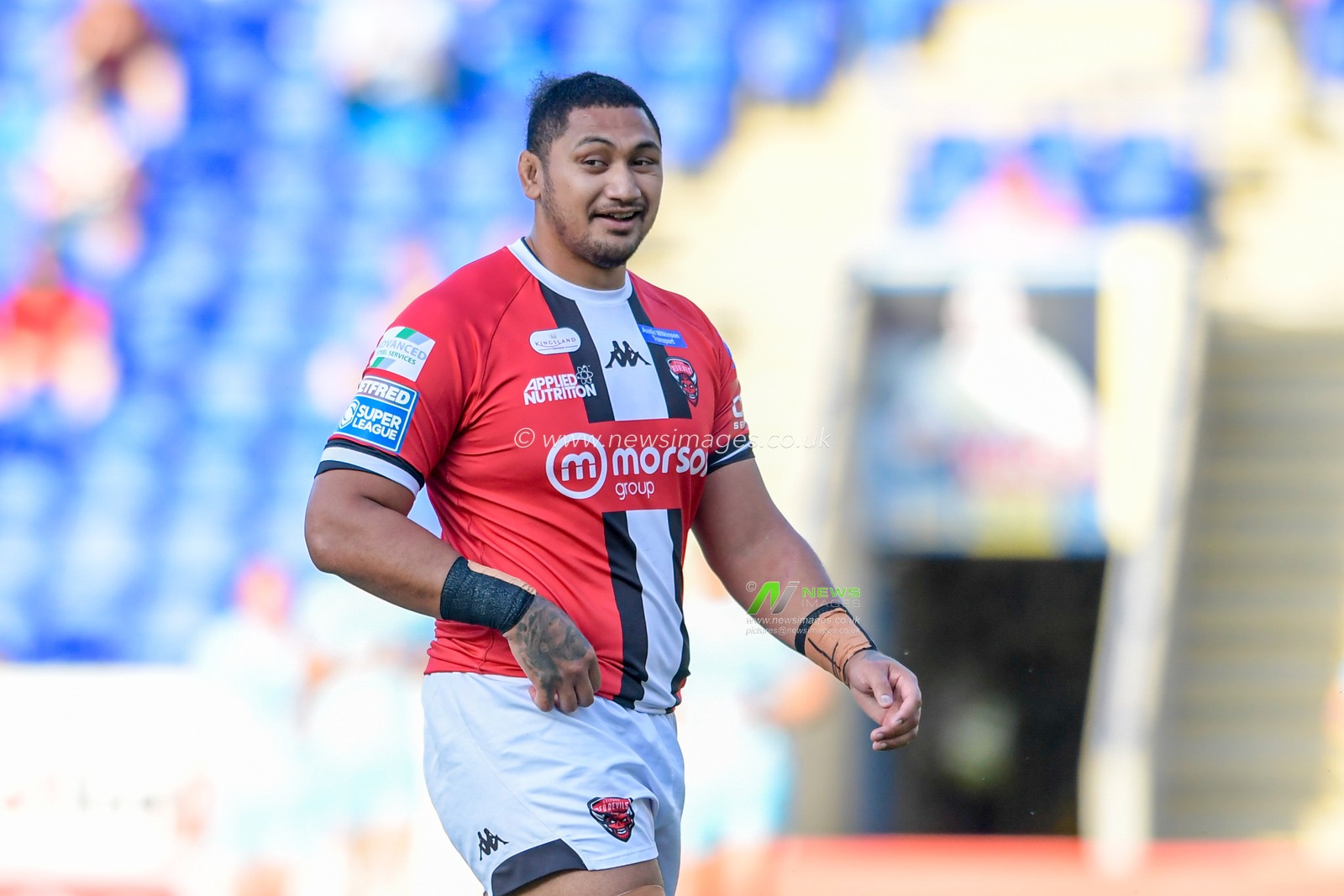 Pauli Pauli (12) of Salford Red Devils in action during the game