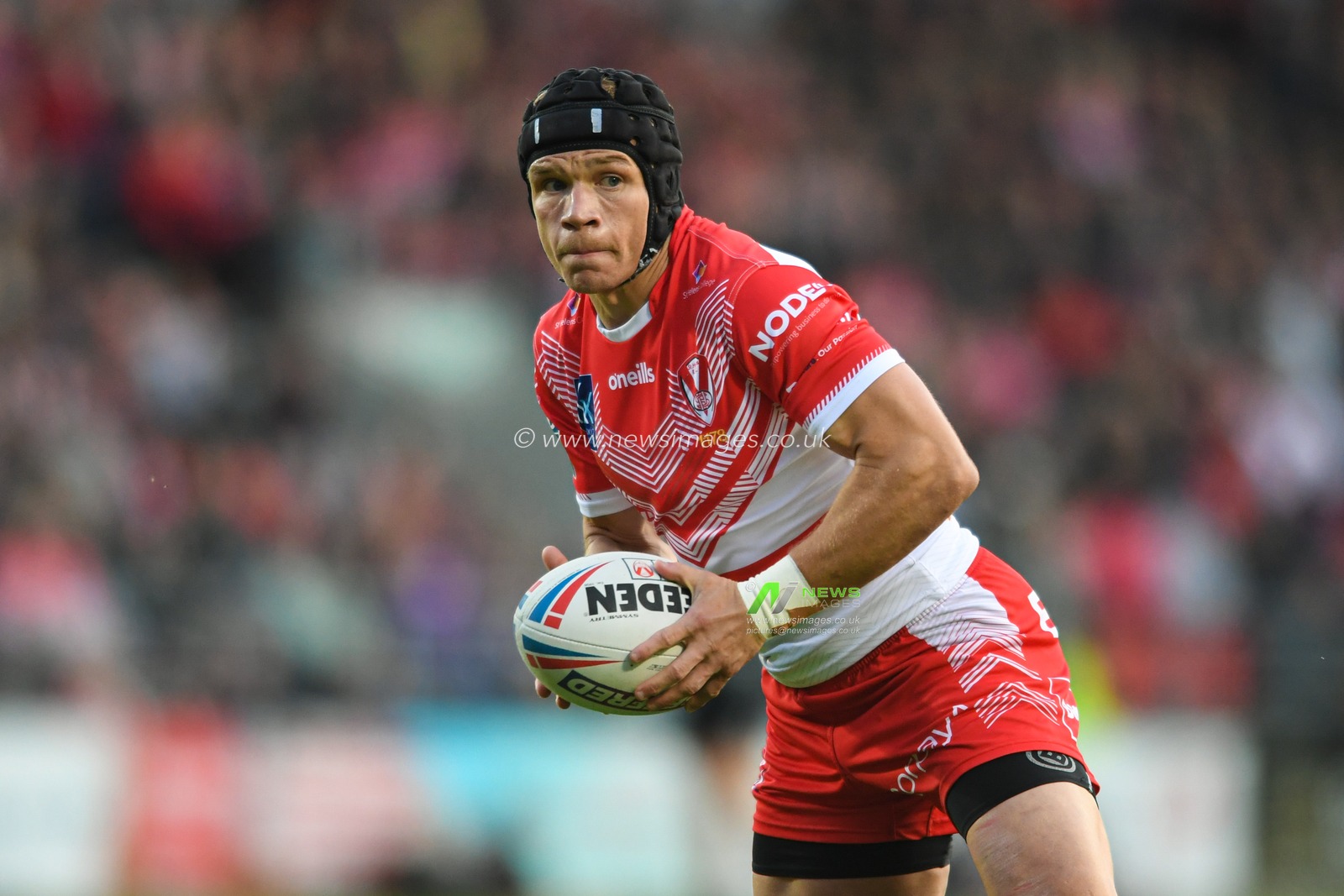 Jonny Lomax #6 of St Helens in action during the game
