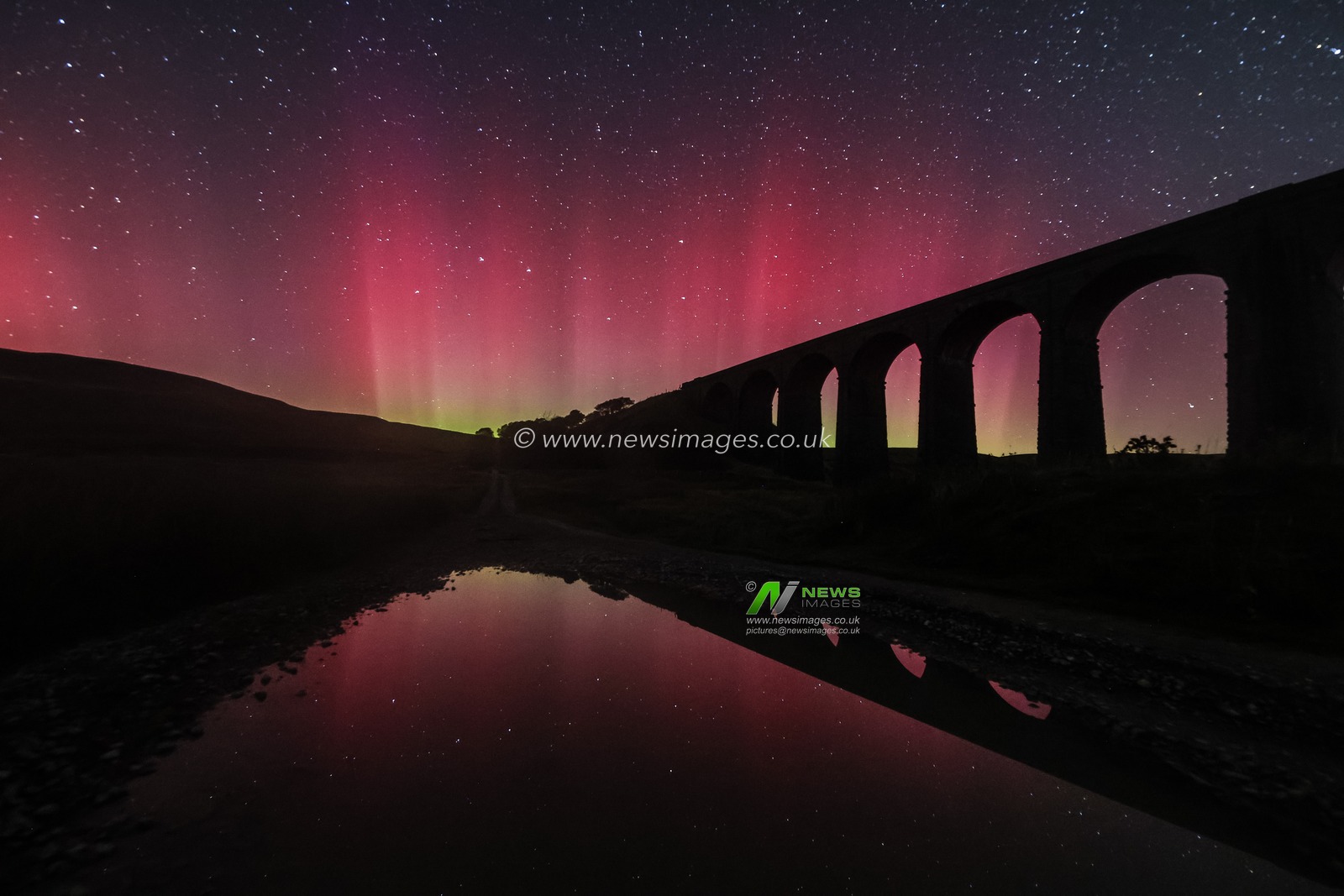 Northern Lights also know as the Aurora Borealis shine across Ribblehead Viaduct, Ribblehead, United Kingdom, 13th September 2024

(Photo by Mark Cosgrove/News Images)