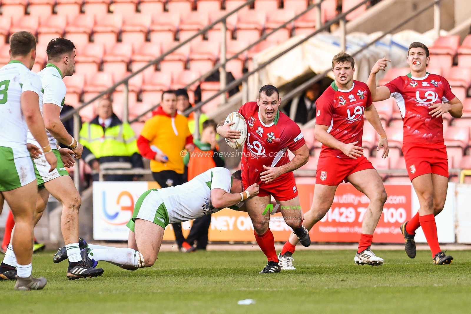 11th November 2018 , Racecourse Ground,  Wrexham, Wales ;  Rugby League World Cup Qualifier,Wales v Ireland ; Steve Parry of Wales is tackled by Declan Oâ€™Donnell of Ireland 


Credit:   Craig Thomas/News Images