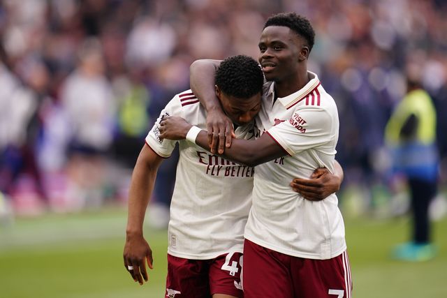 Bukayo Saka of Arsenal and Myles Lewis-Skelly of Arsenal at full time during the Premier League match West Ham United vs Arsenal at London Stadium, London, United Kingdom on 10 May 2026

(Photo by Harvey Murphy/News Images)