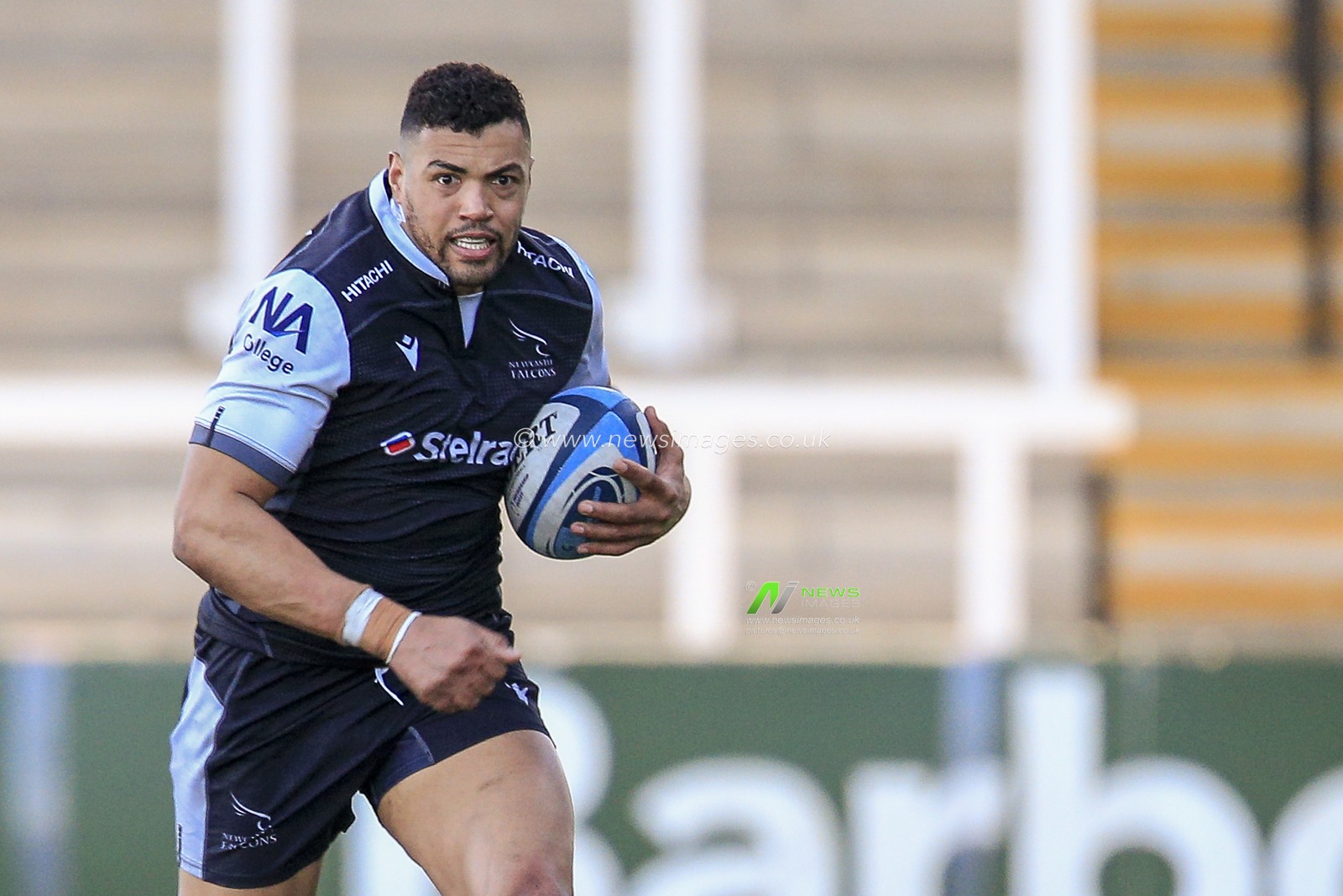 Luther Burrell of Newcastle Falcons carrying the ball forward