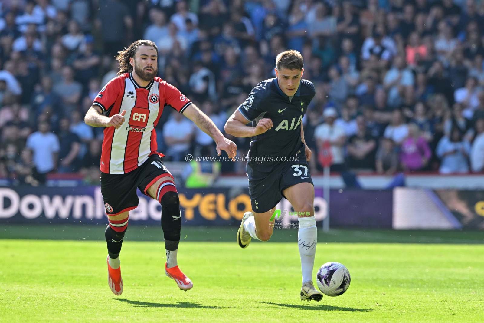 Micky van de Ven of Tottenham Hotspur breaks forward with the ball, during the Premier League match Sheffield United vs Tottenham Hotspur at Bramall Lane, Sheffield, United Kingdom, 19th May 2024

(Photo by Cody Froggatt/News Images)