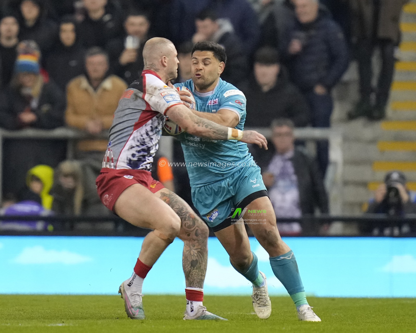 Rhyse Martin #12 of Leeds Rhinos runs at Zak Hardaker #1 of Leigh Leopards during the Betfred Super League Round 10 match Leigh Leopards vs Leeds Rhinos at Leigh Sports Village, Leigh, United Kingdom, 21st April 2023

(Photo by Steve Flynn/News Images)