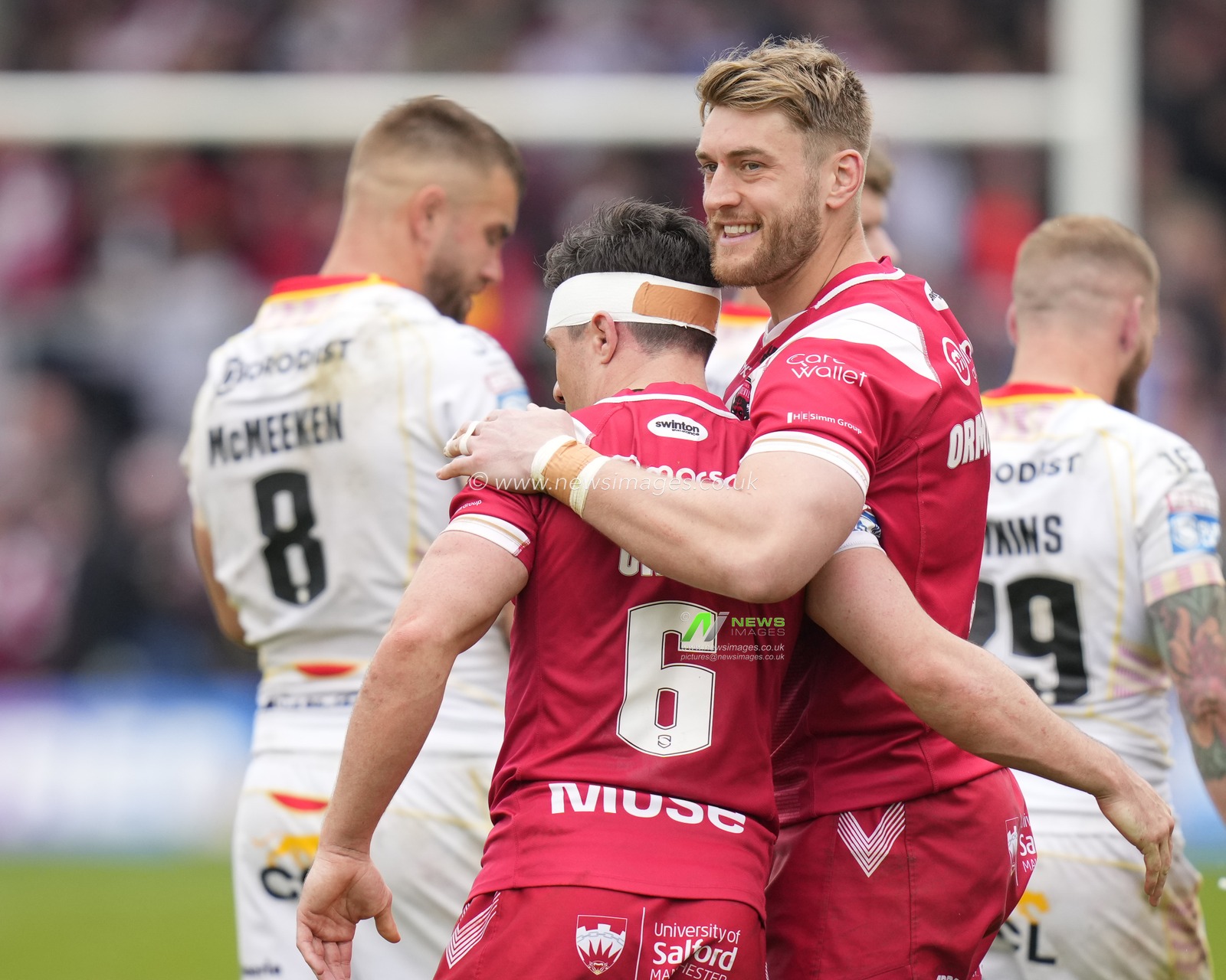 Jack Ormondroyd #8 of Salford Red Devils celebrates victory with Brodie Croft #6 of Salford Red Devils during the Betfred Super League Round 10 match Salford Red Devils vs Catalans Dragons at AJ Bell Stadium, Eccles, United Kingdom, 23rd April 2023

(Photo by Steve Flynn/News Images)