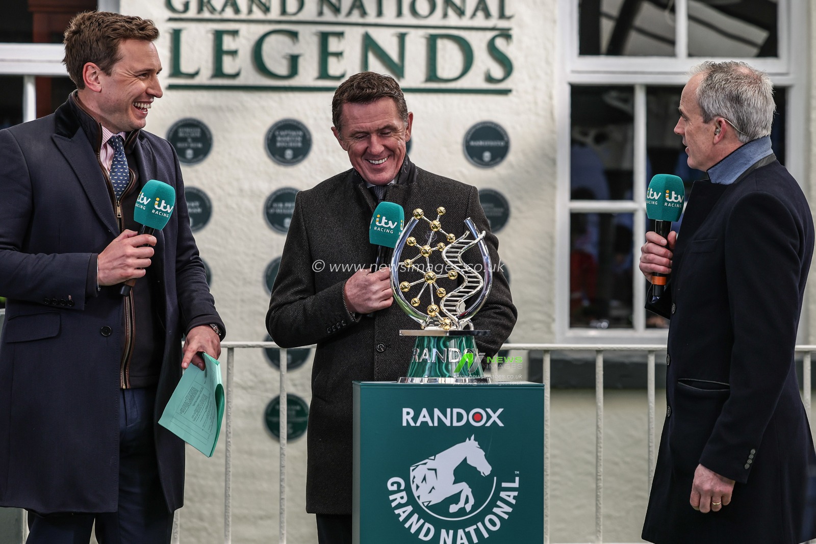 A P McCoy aka Tony McCoy speaks to ITV with the Grand National Trophy during the Randox Grand National 2025 Day 3 Grand National Day at Aintree Racecourse, Liverpool, United Kingdom, 5th April 2025

(Photo by Mark Cosgrove/News Images)