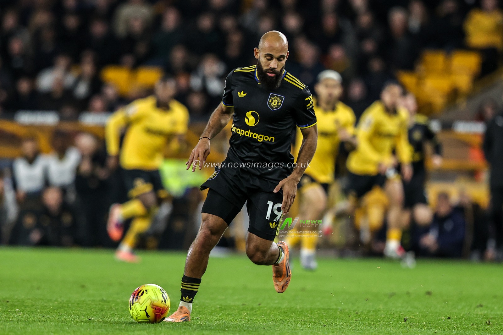 Bryan Mbeumo of Manchester Untied breaks with the ball during the Premier League match Wolverhampton Wanderers vs Manchester United at Molineux, Wolverhampton, United Kingdom, 8th December 2025

(Photo by Alfie Cosgrove/News Images)

*** GER AUT SUI OUT ***